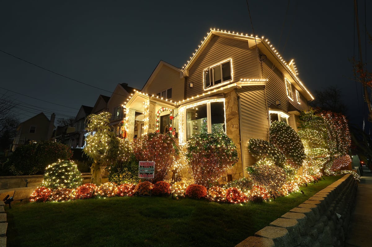 Home decorated with elaborate festive holiday lighting